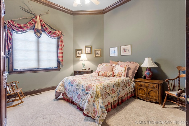 bedroom featuring a ceiling fan, baseboards, crown molding, and carpet flooring
