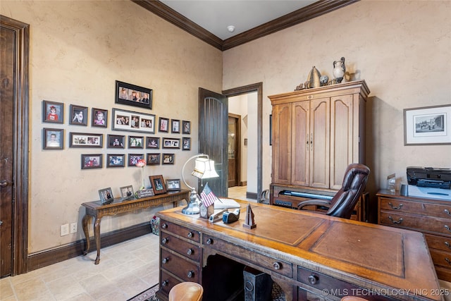 home office with baseboards and crown molding