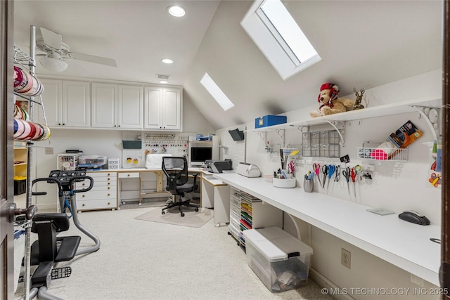 office with visible vents, carpet flooring, lofted ceiling with skylight, and recessed lighting