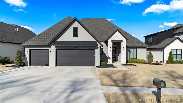 12202 S 102 E Ave, Bixby, OK 74008 - view of front of property with stone siding, a shingled roof, a standing seam roof, and concrete driveway
