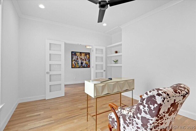 12202 S 102 E Ave, Bixby, OK 74008 - office with crown molding, baseboards, built in shelves, a ceiling fan, and light wood-type flooring