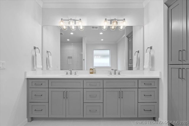 12202 S 102 E Ave, Bixby, OK 74008 - full bath featuring double vanity, visible vents, crown molding, and a sink