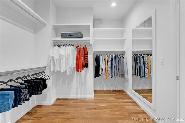 12202 S 102 E Ave, Bixby, OK 74008 - walk in closet featuring wood finished floors