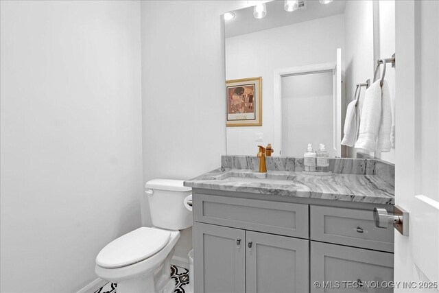 12202 S 102 E Ave, Bixby, OK 74008 - bathroom featuring toilet and vanity
