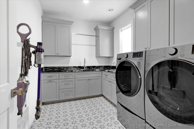 12202 S 102 E Ave, Bixby, OK 74008 - laundry room with washer and clothes dryer, light floors, cabinet space, and a sink