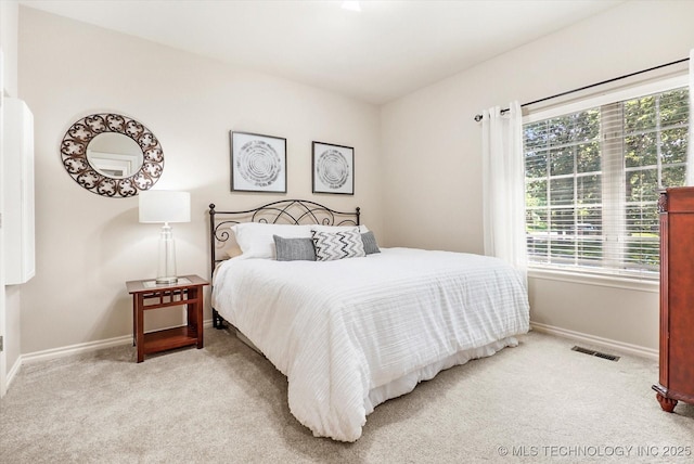 11748 S Canton Ave, Tulsa, OK 74137 - bedroom featuring baseboards, visible vents, and carpet flooring