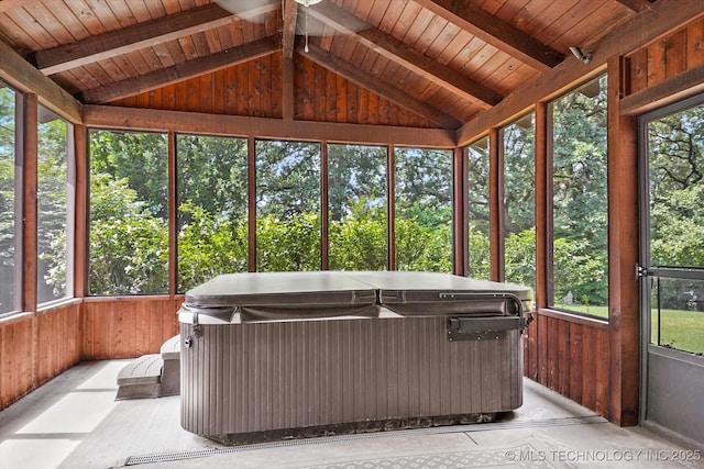 11748 S Canton Ave, Tulsa, OK 74137 - sunroom featuring a jacuzzi, beamed ceiling, and a healthy amount of sunlight