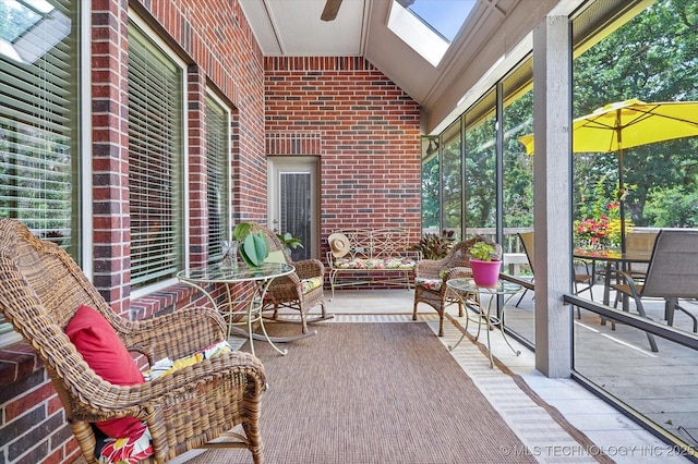 11748 S Canton Ave, Tulsa, OK 74137 - sunroom featuring ceiling fan and a skylight