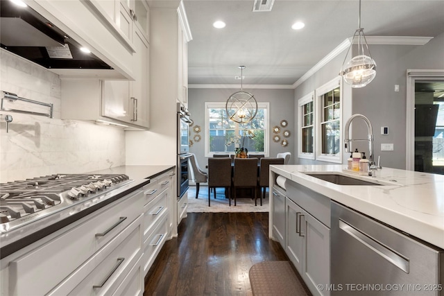 kitchen with custom exhaust hood, recessed lighting, dark wood-style floors, stainless steel appliances, and a sink