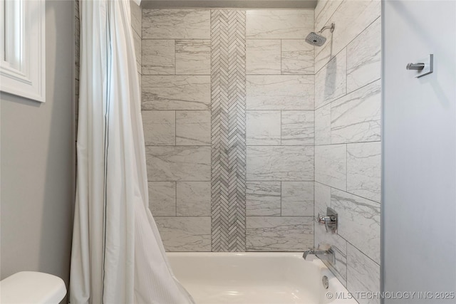full bath with shower / bath combination with curtain and toilet