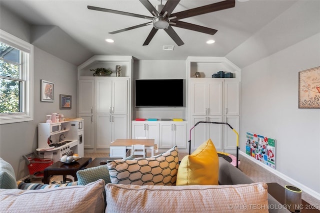 living room with recessed lighting, a ceiling fan, and lofted ceiling