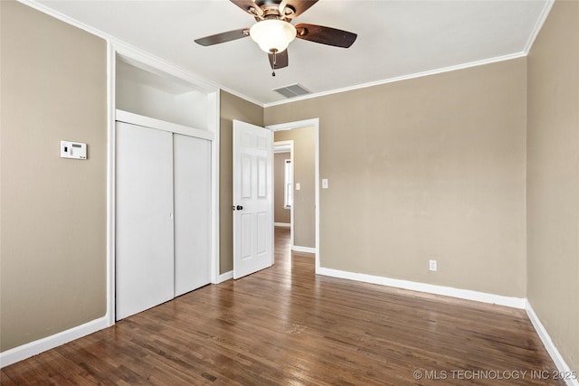 4641 S Trenton Ave, Tulsa, OK 74105 - unfurnished bedroom featuring baseboards, ornamental molding, visible vents, and wood finished floors