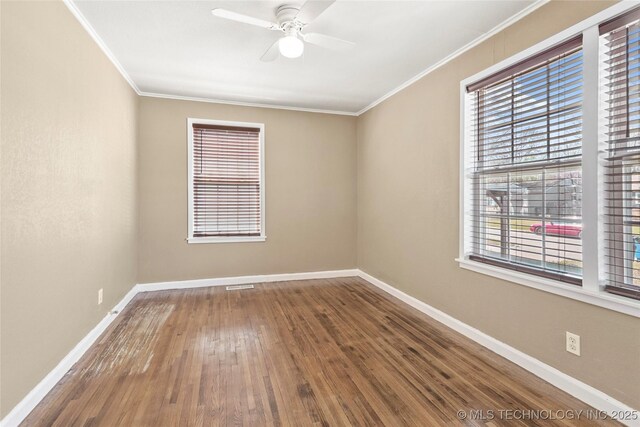 4641 S Trenton Ave, Tulsa, OK 74105 - unfurnished room with a ceiling fan, ornamental molding, baseboards, and a wealth of natural light