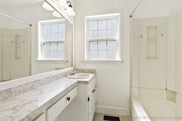 4641 S Trenton Ave, Tulsa, OK 74105 - full bathroom with baseboards, visible vents, shower / tub combination, and vanity