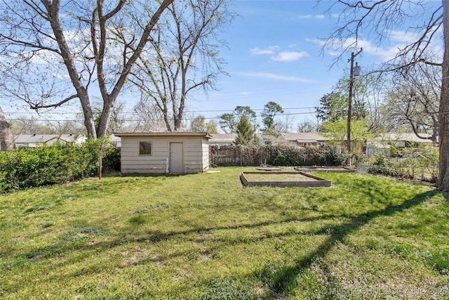 4641 S Trenton Ave, Tulsa, OK 74105 - view of yard with a fenced backyard, an outdoor structure, and a storage shed