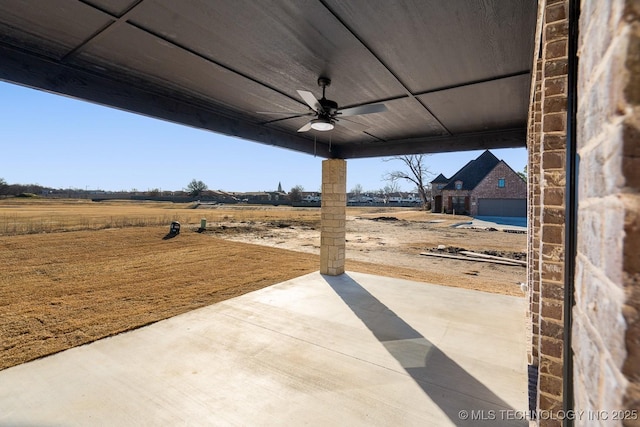 view of patio / terrace featuring a ceiling fan