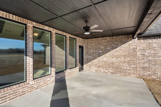 view of patio / terrace featuring ceiling fan
