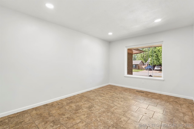 212 W 17th St, Owasso, OK 74055 - empty room with recessed lighting, baseboards, and visible vents