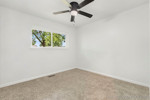 212 W 17th St, Owasso, OK 74055 - carpeted spare room featuring visible vents, a ceiling fan, and baseboards