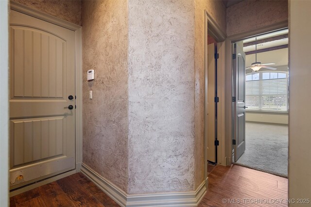 9707 E 90th Ct N, Owasso, OK 74055 - interior space with baseboards, a textured wall, and wood finished floors
