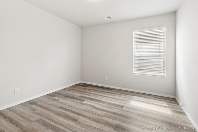 13119 S 72nd E Pl, Bixby, OK 74008 - empty room with baseboards, visible vents, and wood finished floors