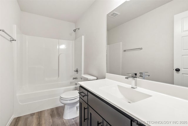 13119 S 72nd E Pl, Bixby, OK 74008 - bathroom with vanity, wood finished floors, and shower / washtub combination