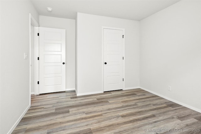 13119 S 72nd E Pl, Bixby, OK 74008 - unfurnished bedroom with baseboards and wood finished floors