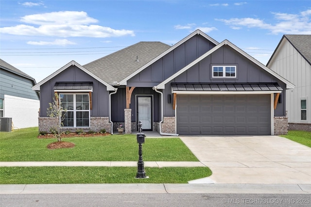 13119 S 72nd E Pl, Bixby, OK 74008 - view of front facade with a front yard, brick siding, a shingled roof, board and batten siding, and concrete driveway