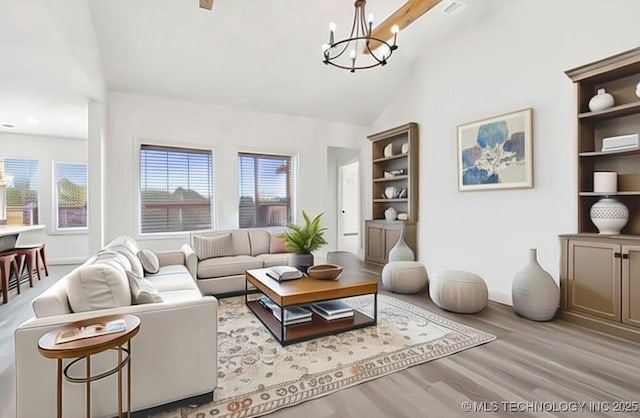 13119 S 72nd E Pl, Bixby, OK 74008 - living room with wood finished floors, a chandelier, and high vaulted ceiling