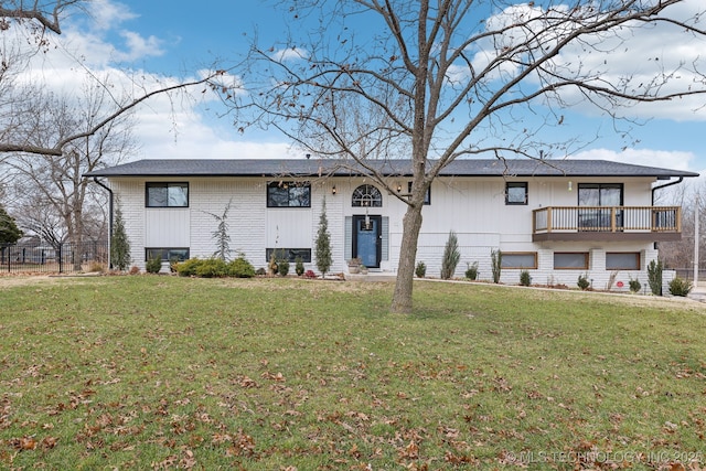 8700 S Union Ave, Tulsa, OK 74132 - bi-level home with brick siding, a front yard, and fence