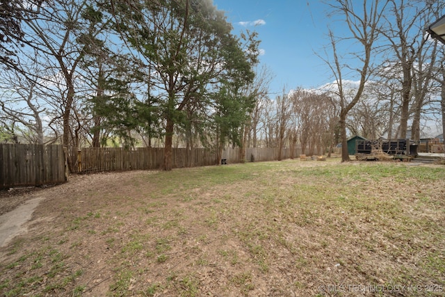 view of yard featuring fence