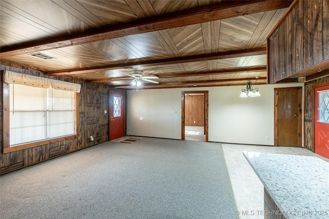703 N Sioux Ave, Claremore, OK 74017 - carpeted spare room featuring wood ceiling, ceiling fan, and wood walls