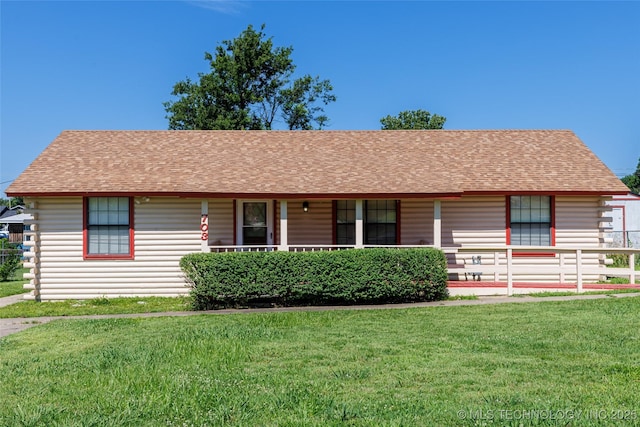 703 N Sioux Ave, Claremore, OK 74017 - ranch-style home featuring log siding, covered porch, and a front yard