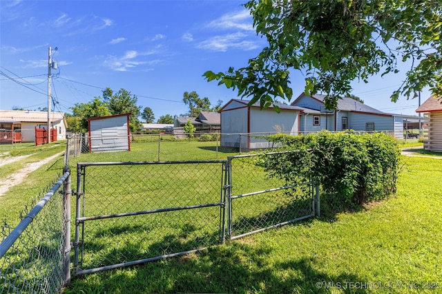 703 N Sioux Ave, Claremore, OK 74017 - view of yard featuring a gate