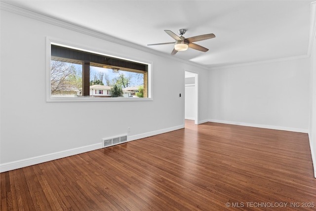 5729 E 24th Pl S, Tulsa, OK 74114 - spare room featuring a ceiling fan, wood finished floors, baseboards, visible vents, and ornamental molding