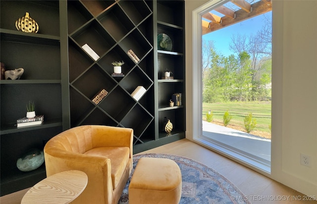 30303 E 59th St S, Broken Arrow, OK 74014 - living area with healthy amount of natural light and built in features