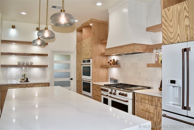 30303 E 59th St S, Broken Arrow, OK 74014 - kitchen with white appliances, open shelves, wall chimney range hood, backsplash, and recessed lighting