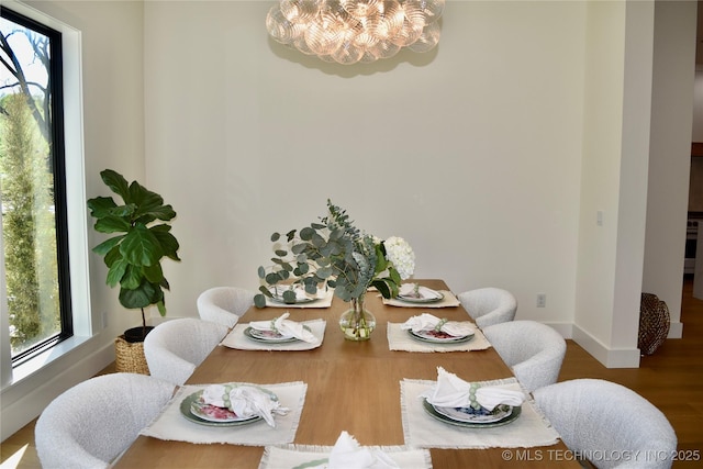 30303 E 59th St S, Broken Arrow, OK 74014 - dining space featuring a chandelier and wood finished floors