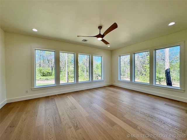 30303 E 59th St S, Broken Arrow, OK 74014 - spare room with ceiling fan, light wood-type flooring, and recessed lighting