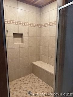 full bathroom featuring a stall shower