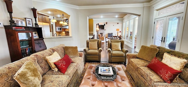 870 Cherry Springs Dr, Tahlequah, OK 74464 - living room with arched walkways, crown molding, and french doors