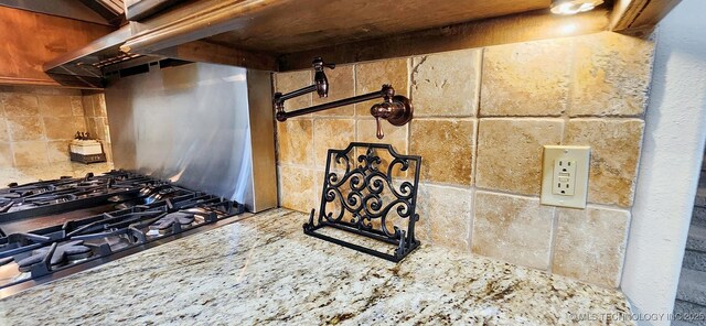 870 Cherry Springs Dr, Tahlequah, OK 74464 - kitchen view of gas cooktop and tasteful backsplash