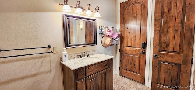 870 Cherry Springs Dr, Tahlequah, OK 74464 - bathroom featuring vanity, tile patterned flooring, and a textured wall