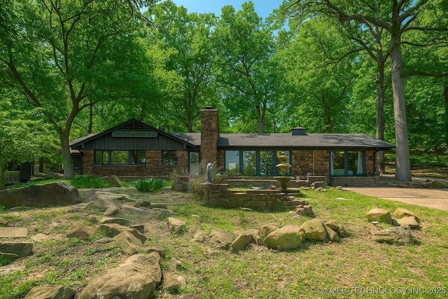 1645 Marian Ln, Eufaula, OK 74432 - view of front of home with a chimney
