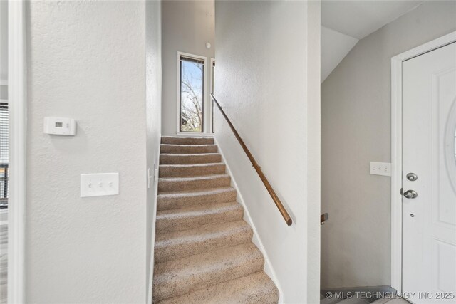 42 Diamond Head Dr Unit 42, Sand Springs, OK 74063 - stairway featuring a textured wall