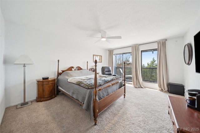 42 Diamond Head Dr Unit 42, Sand Springs, OK 74063 - carpeted bedroom with access to outside and a ceiling fan