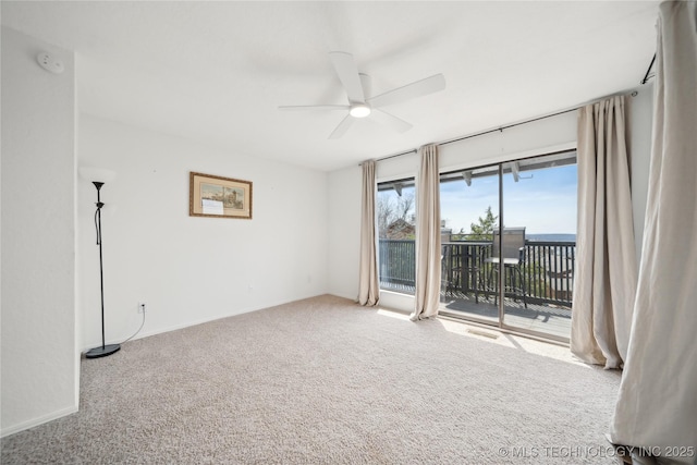 42 Diamond Head Dr Unit 42, Sand Springs, OK 74063 - spare room with ceiling fan, carpet floors, and baseboards