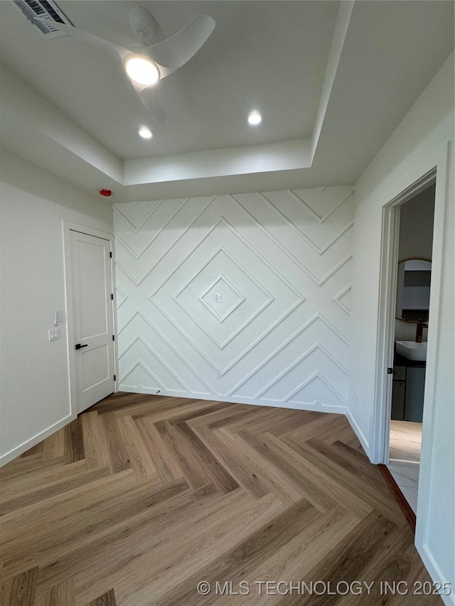3204 N Hartford Ave, Tulsa, OK 74106 - empty room with a raised ceiling, recessed lighting, baseboards, and visible vents