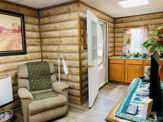 413822 S Sherman, Moyers, OK 74557 - sitting room with light wood-style flooring and rustic walls