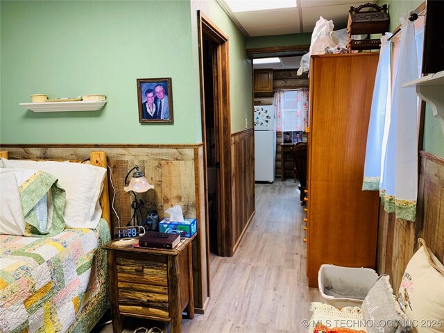 413822 S Sherman, Moyers, OK 74557 - hall featuring wainscoting, wood finished floors, and a paneled ceiling